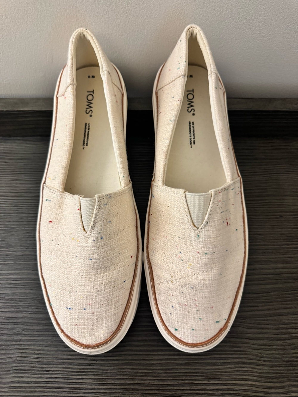TOMS Womenโs Natural Canvas Slip-On Shoes
